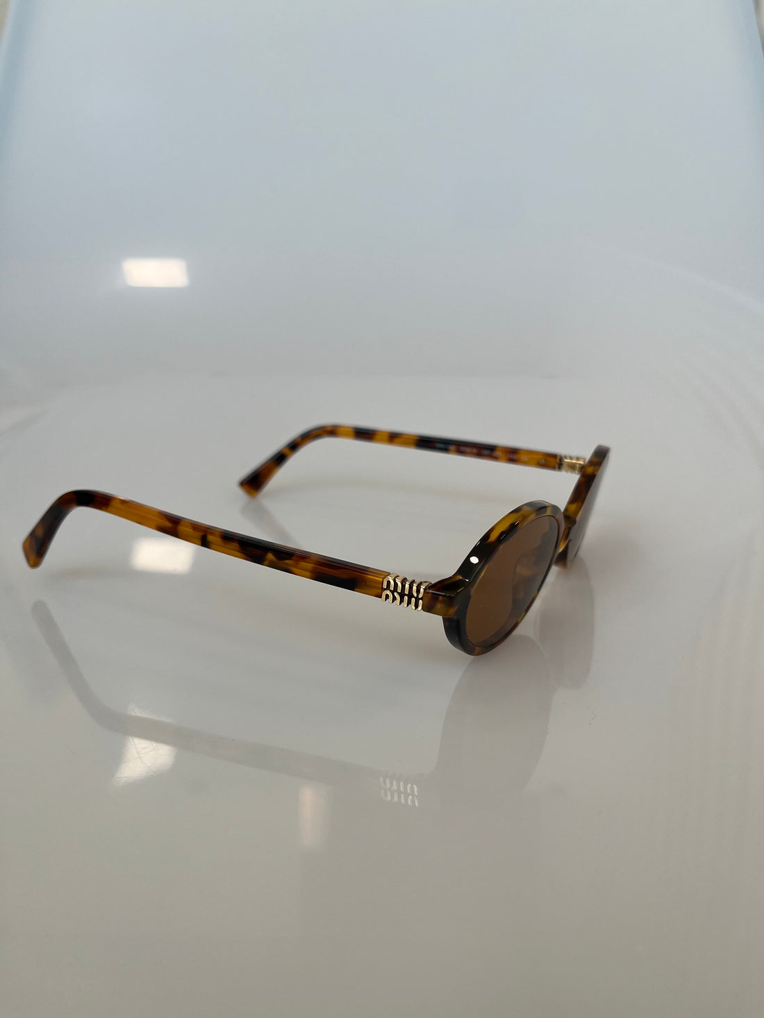 Óculos de sol Miu Miu Regard